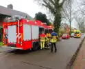 Beknelling in woning, brandweer assisteert