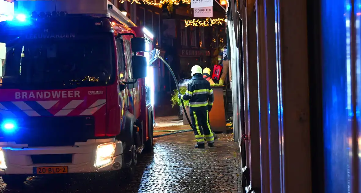 Keukenbrand in hamburgerrestaurant - Foto 2