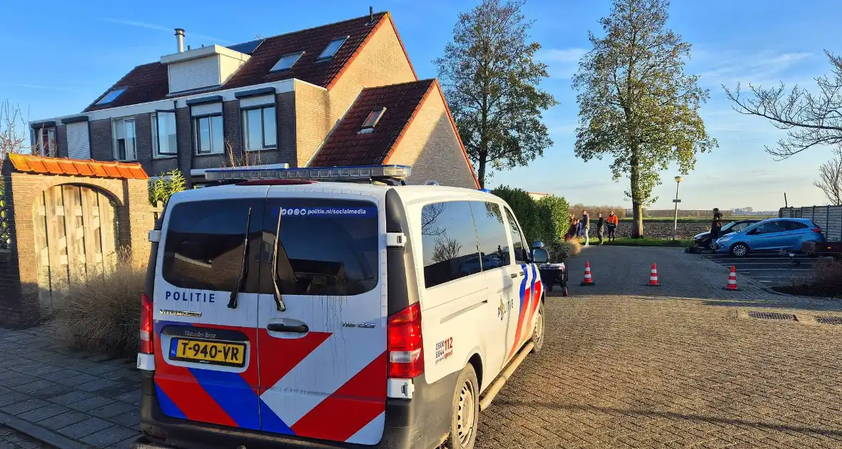 Brandweer graaft in tuin wegens gaslekkage - Foto 6