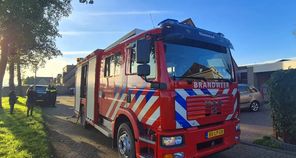 Brandweer graaft in tuin wegens gaslekkage - Foto 8