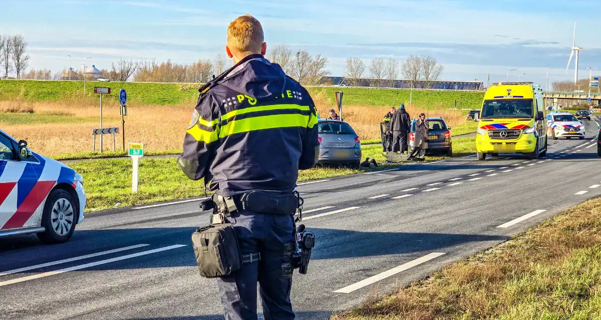 Toevallig passerende ambulance meldt frontale aanrijding - Foto 8