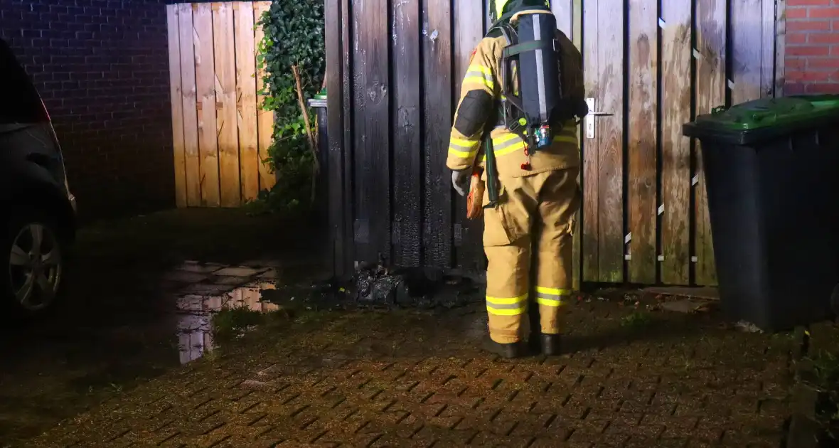 Politie onderzoekt mogelijke brandstichting na containerbrand - Foto 4