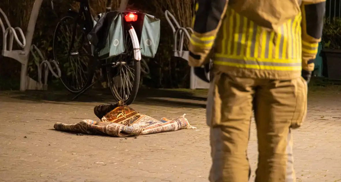 Brandend kleed zorgt voor rookontwikkeling in appartement - Foto 4