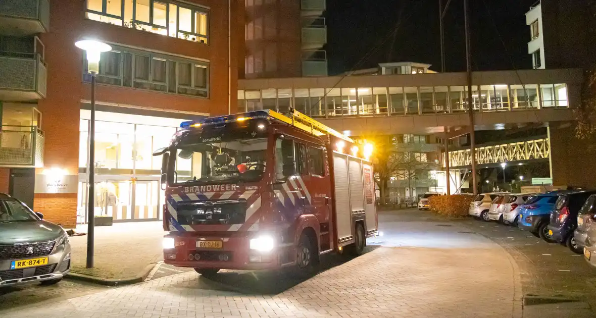 Brandend kleed zorgt voor rookontwikkeling in appartement - Foto 7