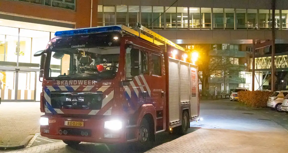 Brandend kleed zorgt voor rookontwikkeling in appartement - Foto 8