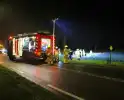 Auto belandt tussen prij door aanrijding