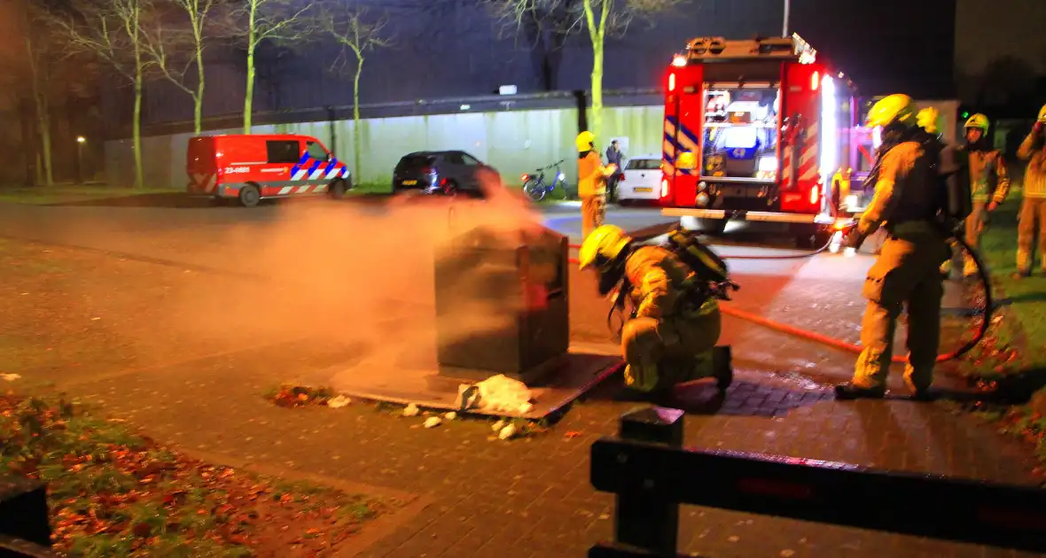 Brand in ondergrondse container gedoofd - Foto 1