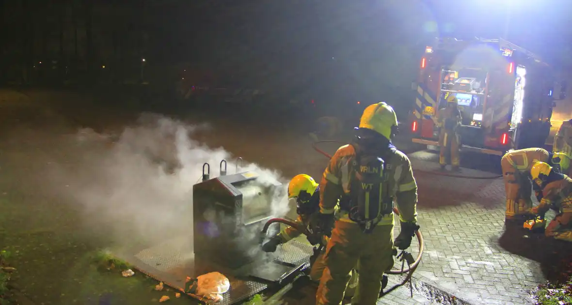 Brand in ondergrondse container gedoofd - Foto 11