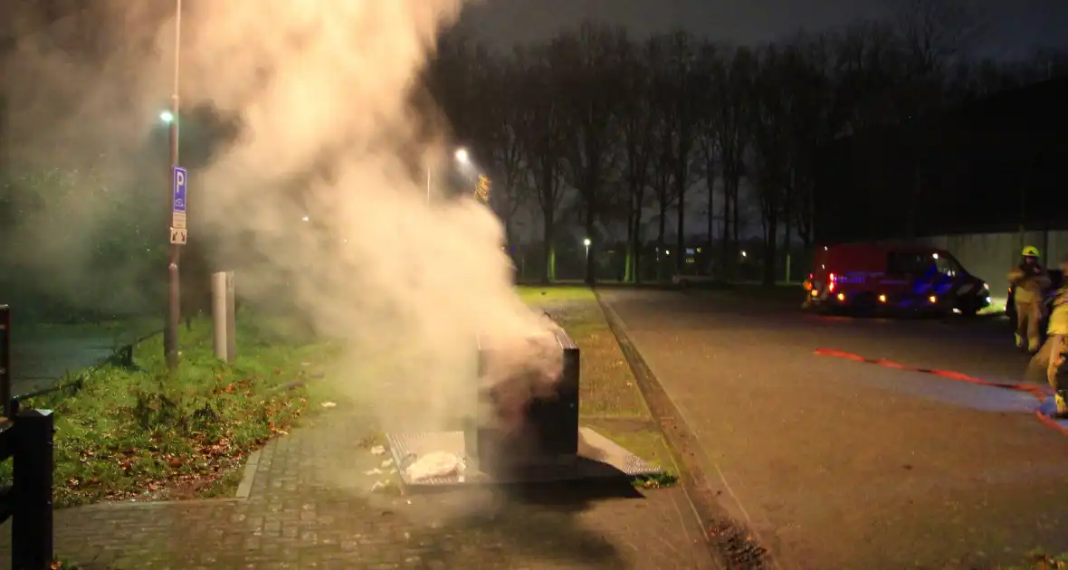 Brand in ondergrondse container gedoofd - Foto 2