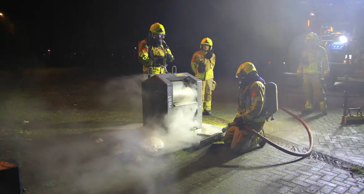 Brand in ondergrondse container gedoofd - Foto 6