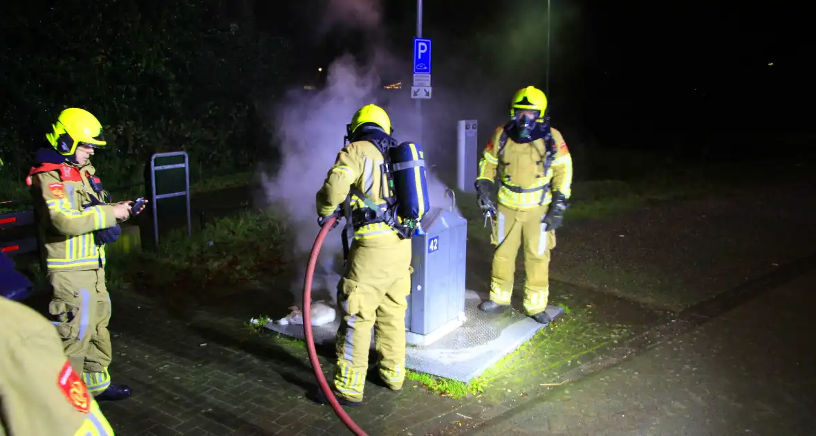 Brand in ondergrondse container gedoofd - Foto 7