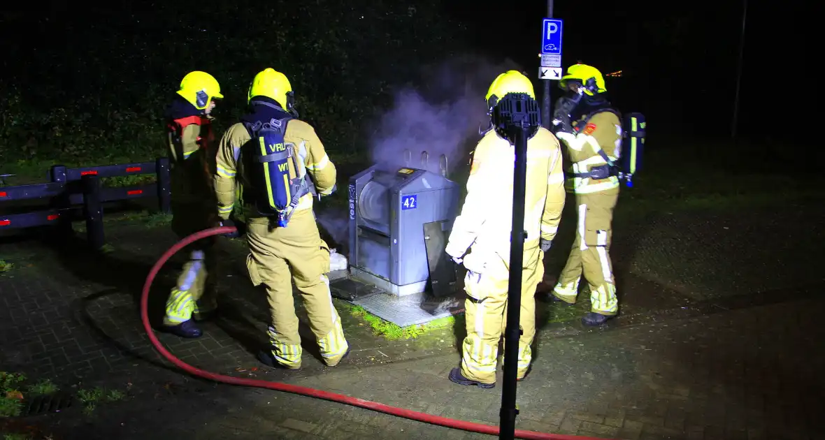 Brand in ondergrondse container gedoofd - Foto 9