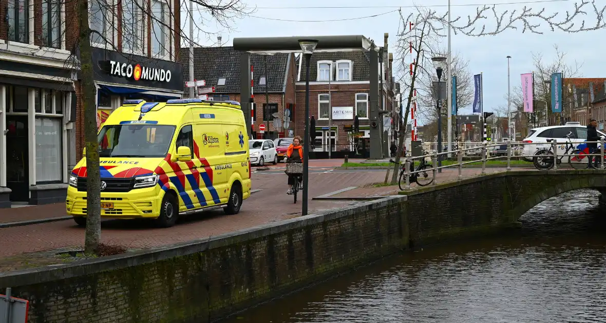 Fietsster belandt in gracht - Foto 1