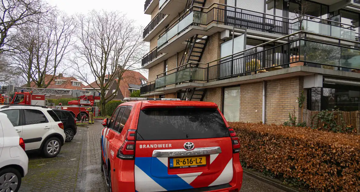 Wooncentrum deels ontruimd wegens containerbrand in berging - Foto 15