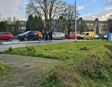 Schade bij kop-staartbotsing twee voertuigen