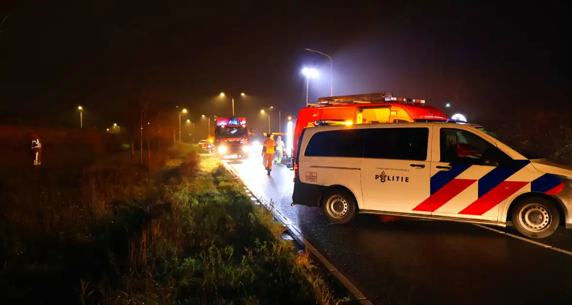 Voertuig op de kop in sloot, bestuurder spoorloos - Foto 11