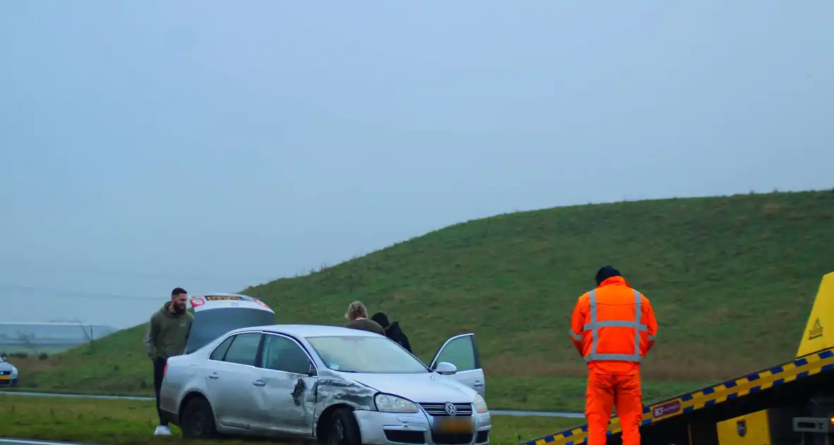 File na aanrijding tussen twee voertuigen