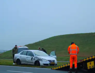 File na aanrijding tussen twee voertuigen