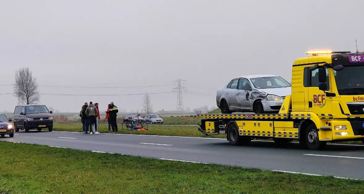 File na aanrijding tussen twee voertuigen - Foto 12