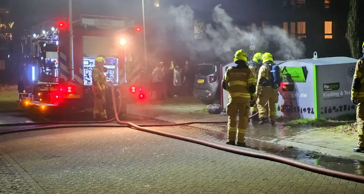 Opnieuw brand in kledingcontainer, politie start onderzoek - Foto 5