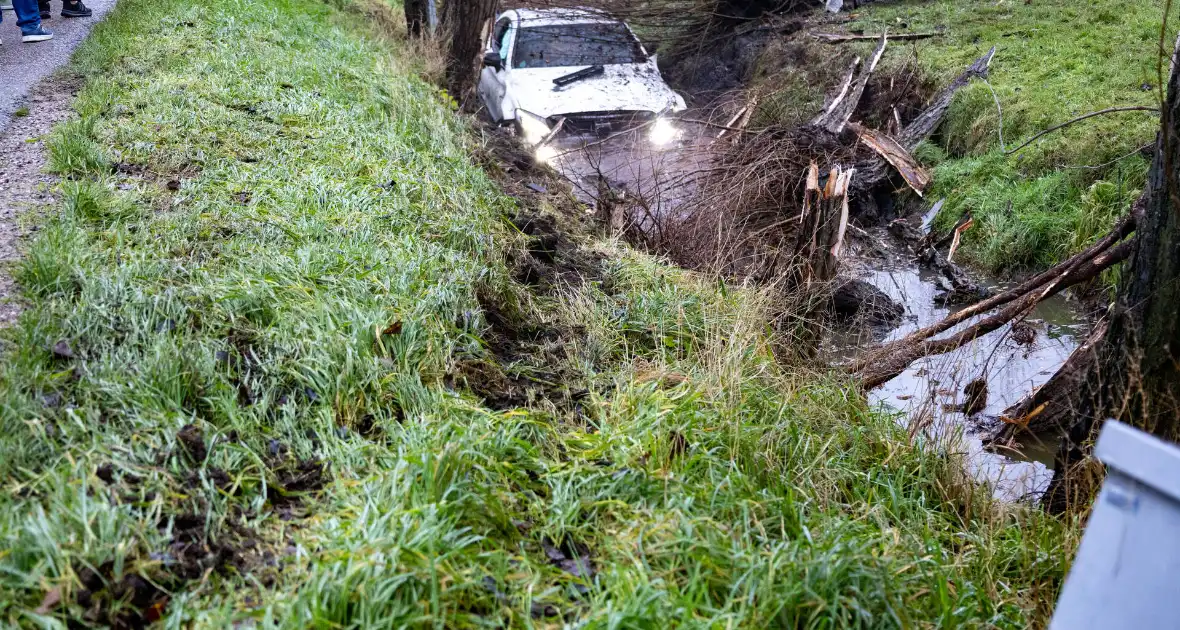 Forse schade bij te water geraakte auto - Foto 4