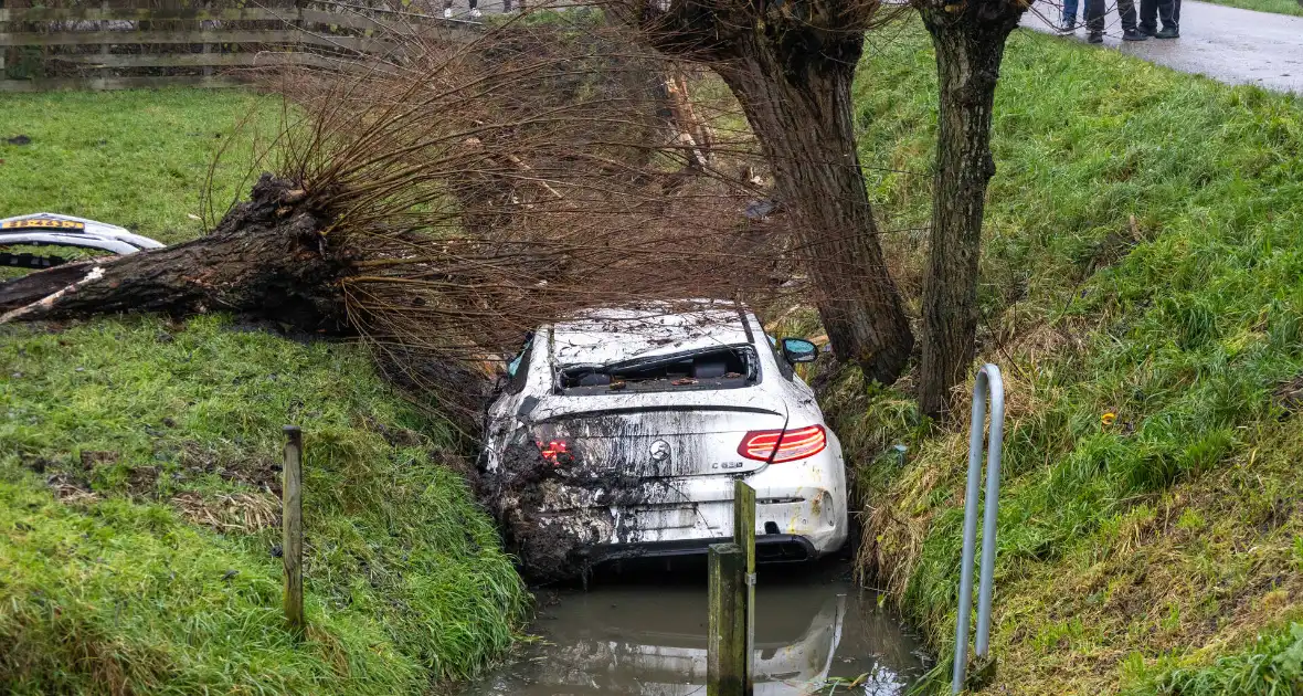 Forse schade bij te water geraakte auto - Foto 5