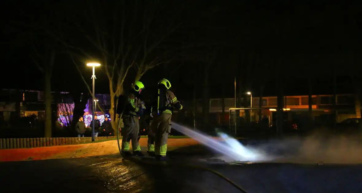 Brandweer blust kerstbomen - Foto 1