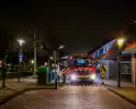 Brandweer laat ondergrondse container vollopen