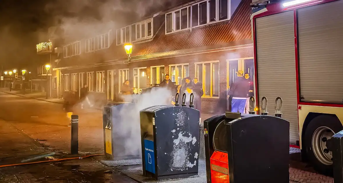 Brandweer laat ondergrondse container vollopen - Foto 2