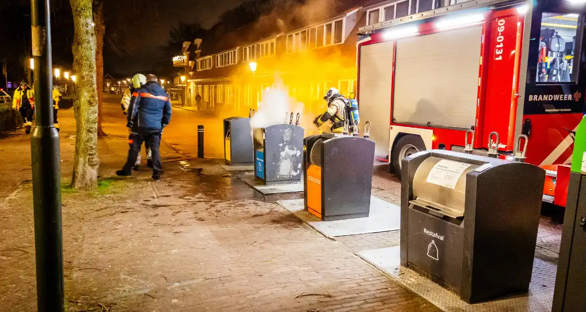 Brandweer laat ondergrondse container vollopen - Foto 3