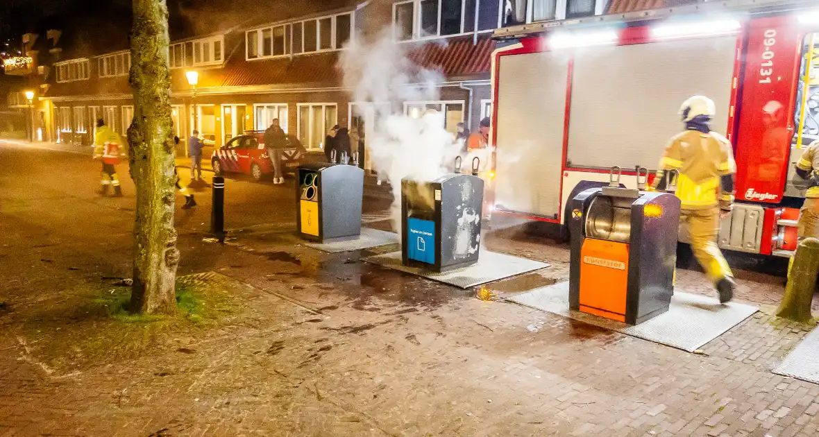 Brandweer laat ondergrondse container vollopen - Foto 5