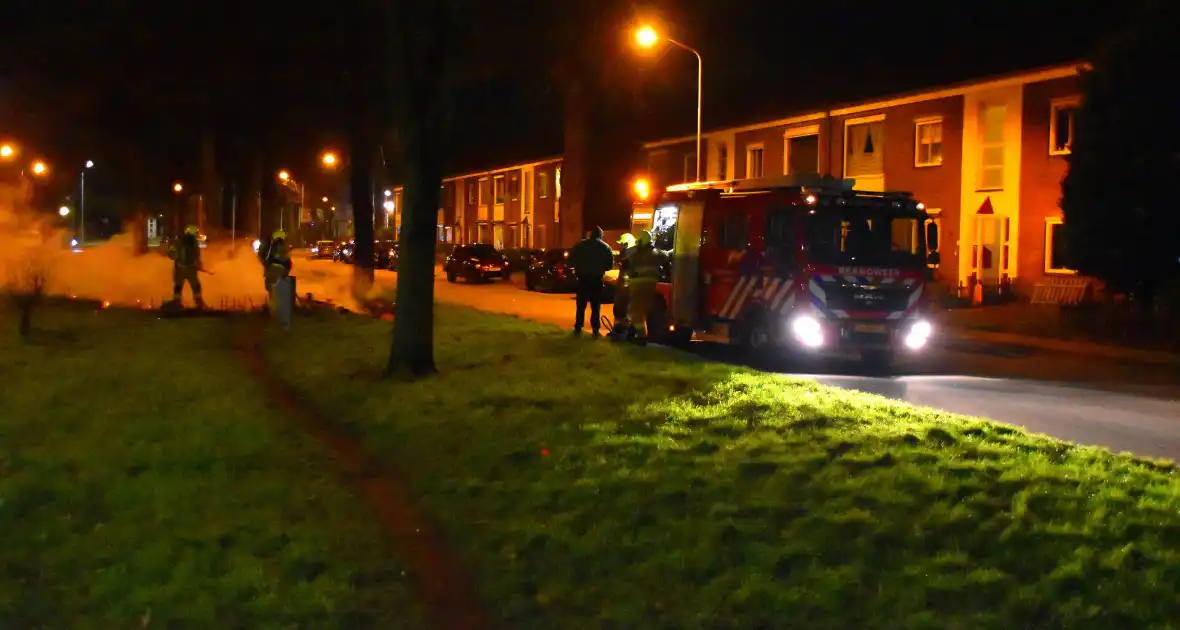 Brandweer blust hoop afval