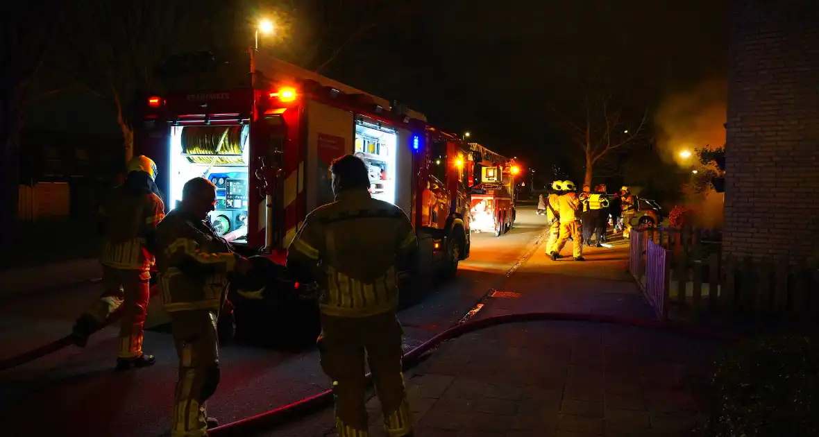 Woningen beschadigd door brand in bijgebouw - Foto 4