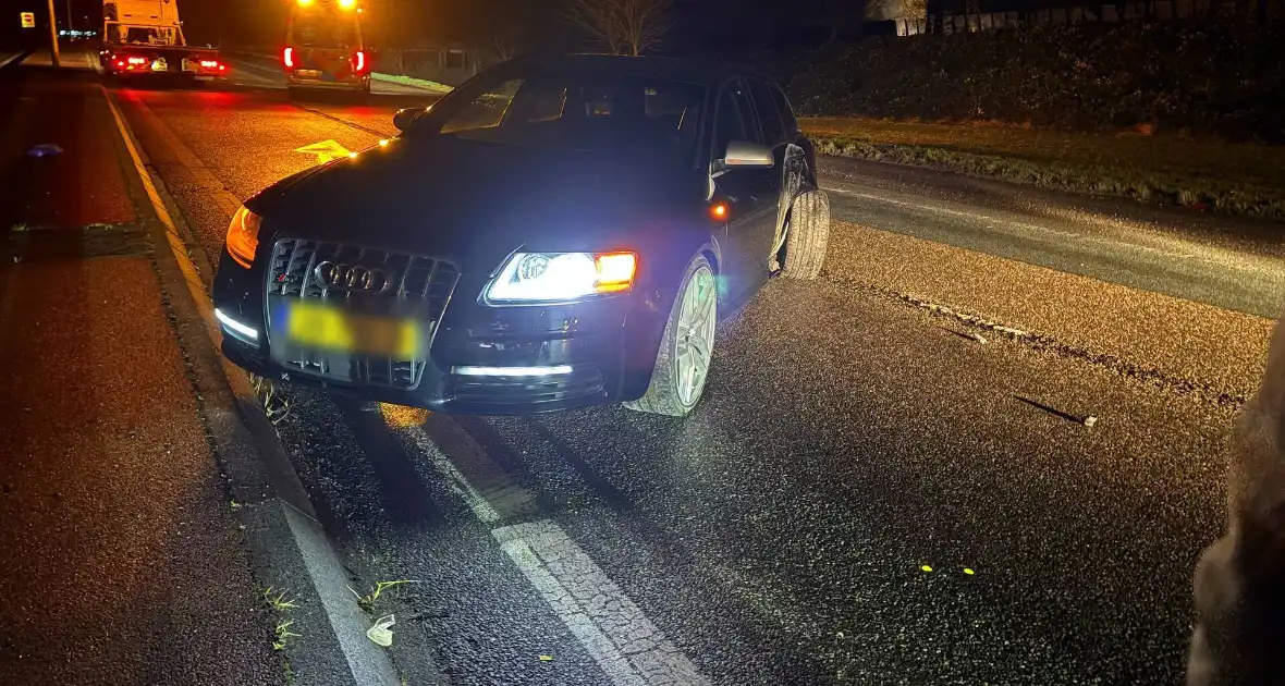 Auto in de slip bij oprit