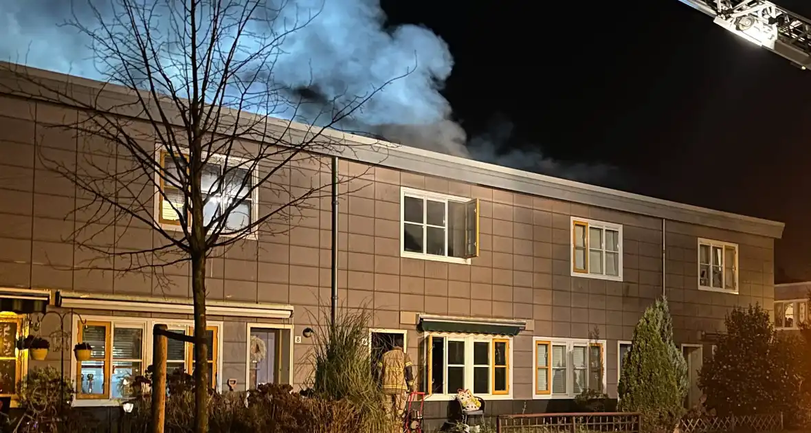 Flinke schade en woning vol rook door brand - Foto 1