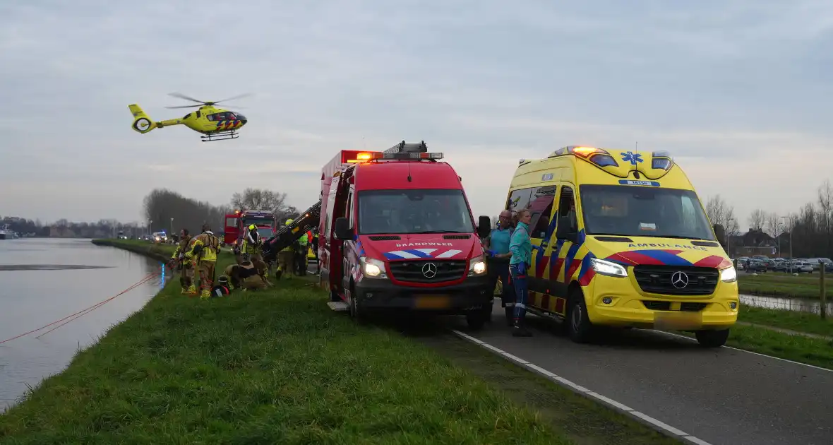 Auto te water met bestuurder in het raam - Foto 6