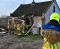 Tractor rijdt tegen woning en stort deels in