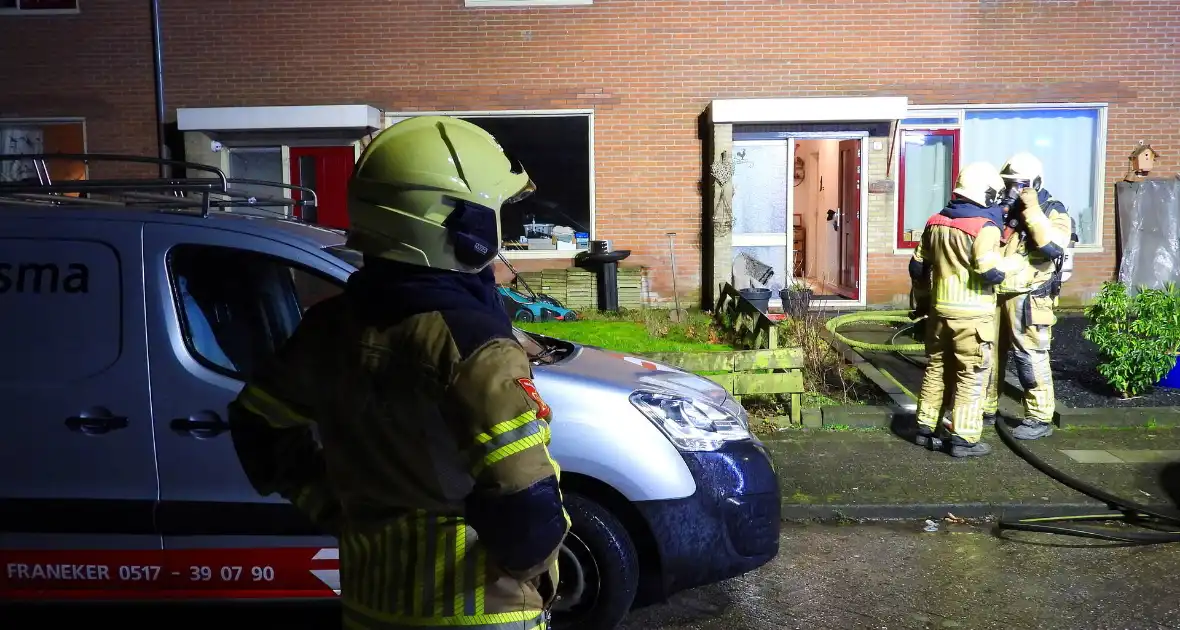 Brandweer ingezet bij woningbrand - Foto 4