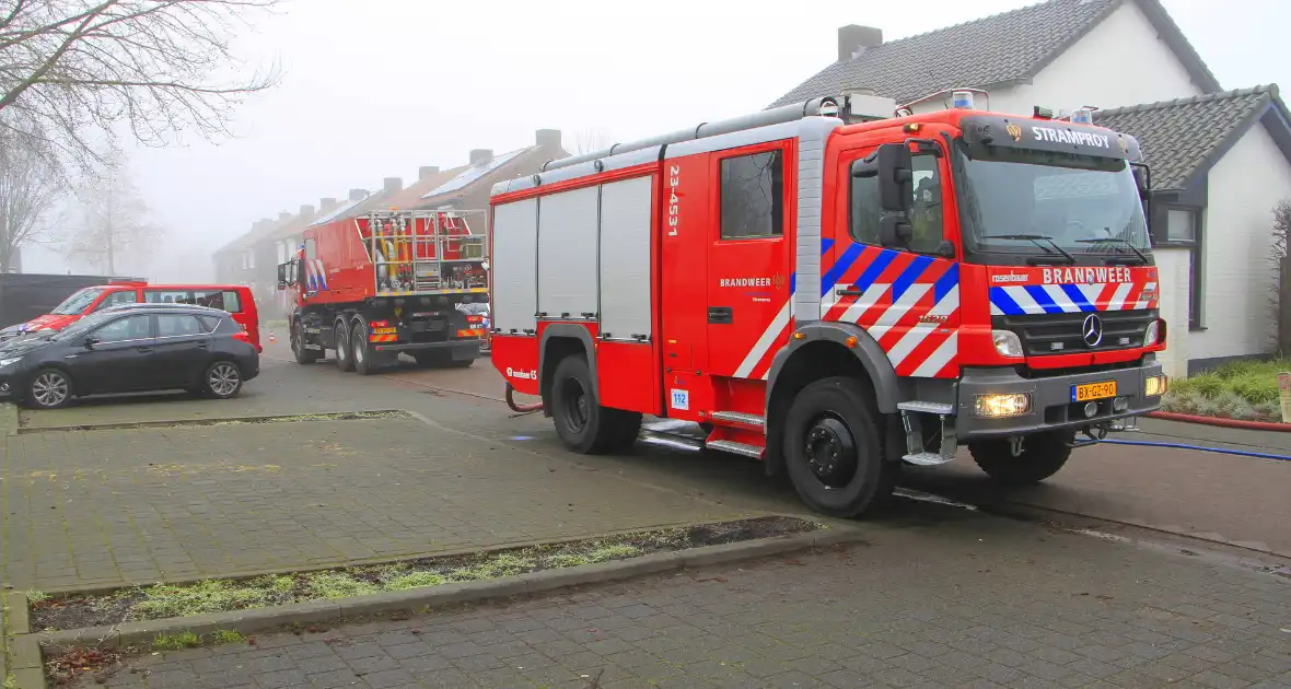 Vuilnis vat vlam in vuilniswagen - Foto 3