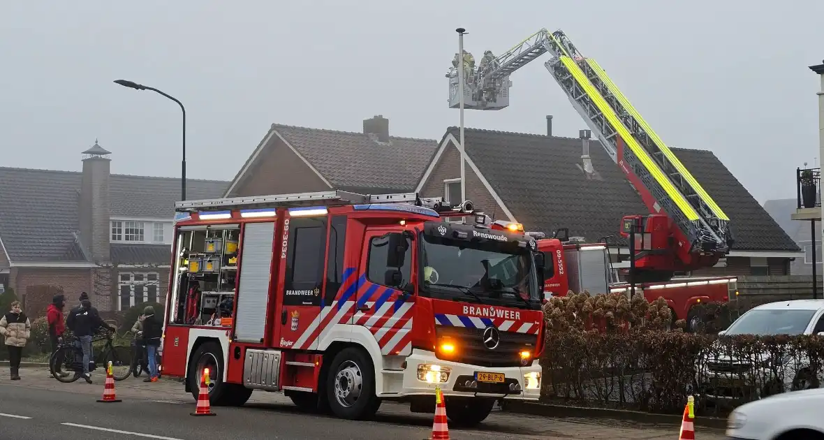 Brandweer bestrijdt schoorsteenbrand - Foto 4