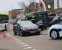 Schade na botsing tussen personenauto en bestelbus