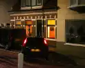 Automobilist rijdt tegen woning