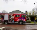 Brand in schoorsteen van fotowinkel