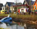 Auto te water na aanrijding