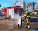 Brandweer dooft brand in prullenbak