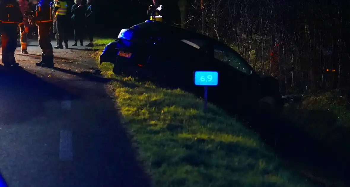 Trekker en auto in botsing - Foto 1