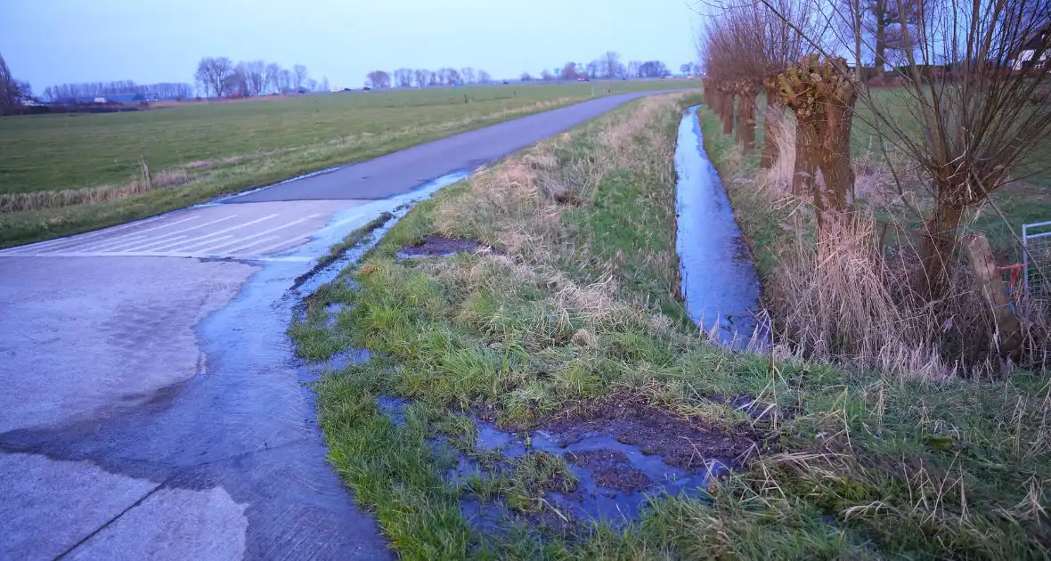 Mogelijk gladde weg in vooruitzicht door gesprongen waterleiding - Foto 1