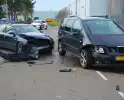 Flinke schade na botsing met twee personenauto's