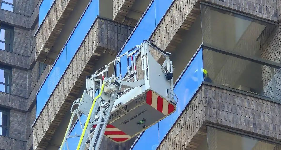 Brandweer ingezet voor persoon op balkon - Foto 5