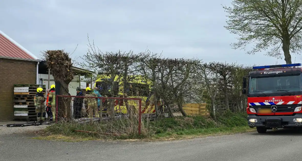 Persoon bekneld geraakt bij incident - Foto 4
